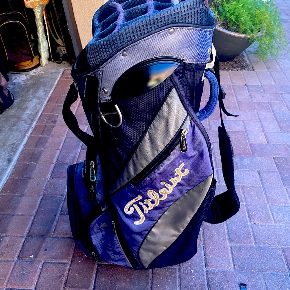 Titleist golf cart bag with shoulder strap.